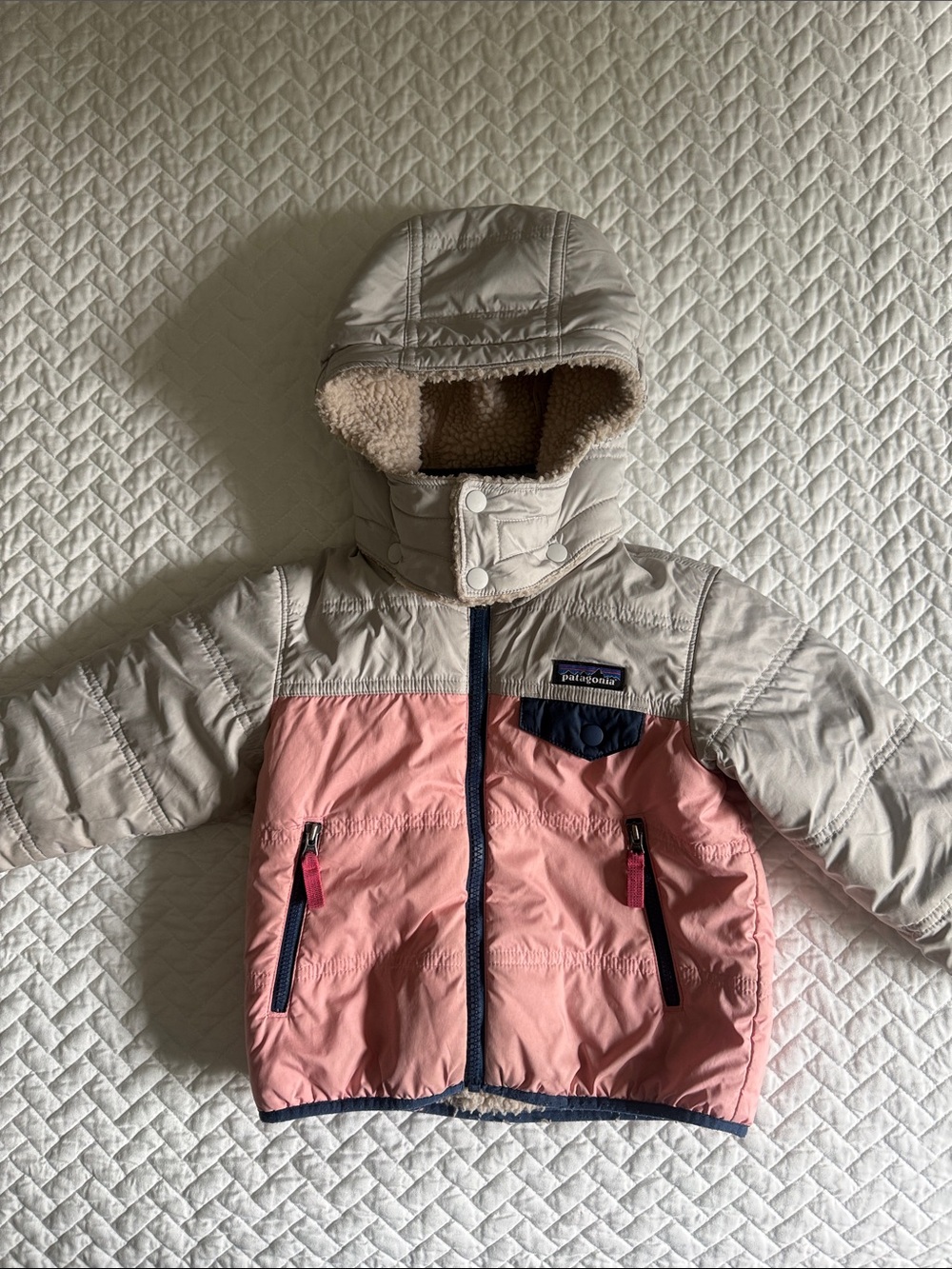 Girls Reversible Patagonia Kids Hooded Puffer Jacket in Pink and Cream, 2T